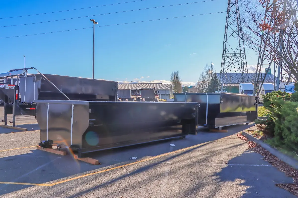Roll-off dumpster ready for waste disposal at job site for Yard Waste Dumpster Rental in North Hempstead
